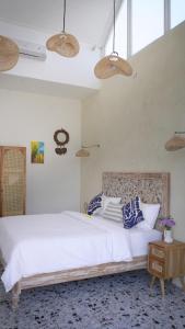 Ένα ή περισσότερα κρεβάτια σε δωμάτιο στο Brand New ! Villa Bella Lovina - Private Pool - Rice Field View