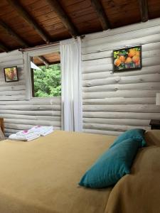 Postel nebo postele na pokoji v ubytování El Durazno Apart Hotel y Cabañas + 14 fotografií