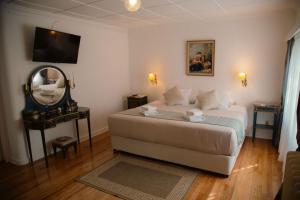 Postel nebo postele na pokoji v ubytování Estancia Río de Los Ciervos + 27 fotografií