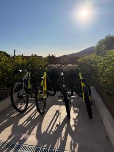 a group of bikes parked on a balcony at Golden Gaia Villas in Kipía
