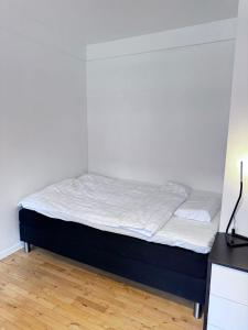 Postel nebo postele na pokoji v ubytování Bright and cozy apartment in north Copenhagen close to nature