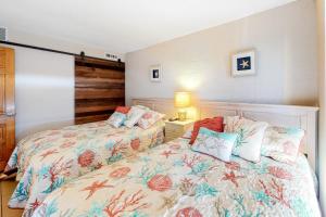 Ένα ή περισσότερα κρεβάτια σε δωμάτιο στο Polynesian 503