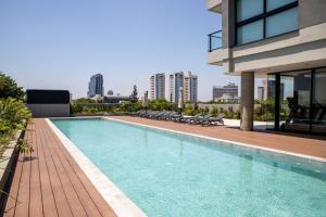 Πισίνα στο ή κοντά στο Bright and Stylish 1BR Apt near Shopping del Sol