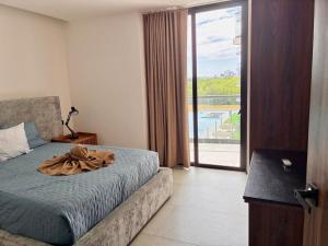 Postel nebo postele na pokoji v ubytování Hospedaje con Estilo en la Marina, Vistas Hermosas + 25 fotografií