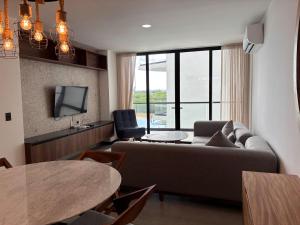 TV a/nebo společenská místnost v ubytování Hospedaje con Estilo en la Marina, Vistas Hermosas