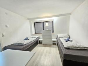 Postel nebo postele na pokoji v ubytování Wohnreich Blaubeuren Weiler 1 room apartment - room 3