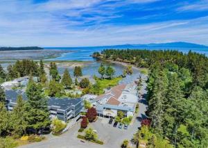 an aerial view of a resort with a lake at Oceanside Getaway in Nanoose Bay