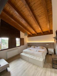 Ένα ή περισσότερα κρεβάτια σε δωμάτιο στο La Huerce Silvestre - apartamento abuela