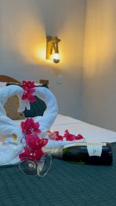 Ένα ή περισσότερα κρεβάτια σε δωμάτιο στο Chalé Caju