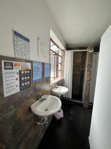 Koupelna v ubytování Hostal CQ Chapinero + 63 fotografií