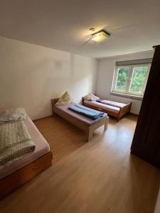 Postel nebo postele na pokoji v ubytování ASX Tr2