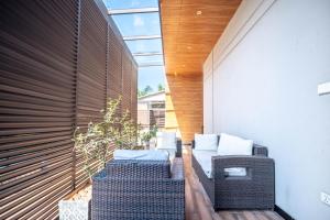 Area tempat duduk di The Soho by Aramstays +6 foto