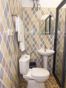 Koupelna v ubytování Senalli Hotel