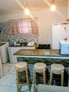 Kuchyň nebo kuchyňský kout v ubytování Apartamento Completo e Centralizado 1