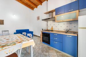 Kuchyň nebo kuchyňský kout v ubytování Residence Sulcis 3