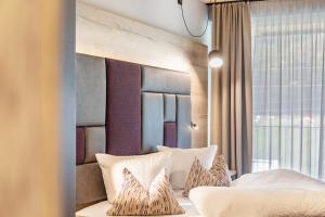 Hotel zum Schwanen - Appartement 2にあるベッド