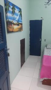 Ένα ή περισσότερα κρεβάτια σε δωμάτιο στο Hostel Green house beach