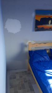 Ένα ή περισσότερα κρεβάτια σε δωμάτιο στο Hostel Green house beach