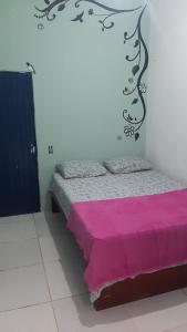 Ένα ή περισσότερα κρεβάτια σε δωμάτιο στο Hostel Green house beach