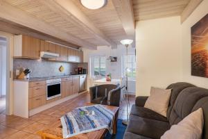 Kuchyň nebo kuchyňský kout v ubytování Ferienhaus Blick ins Tüterland