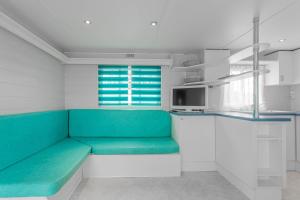 TV a/nebo společenská místnost v ubytování Mobilhome au vert