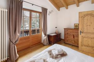 Postel nebo postele na pokoji v ubytování Chalet Royal