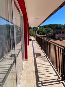a balcony with a view of a street at Departamentos Don Julio in Guaraní