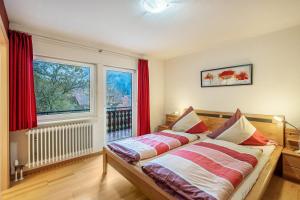 Una cama o camas en una habitación de Grundhof 2