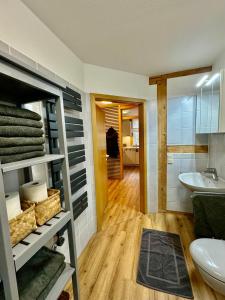 a bathroom with a sink and a toilet at Wohnung In Wolfenbüttel in Wolfenbüttel