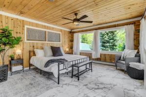 a bedroom with a bed and a ceiling fan at 4925 Pike in Cascade-Chipita Park