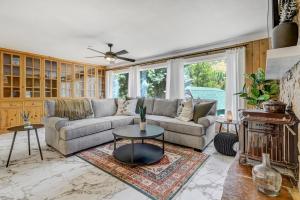 a living room with a couch and a table at 4925 Pike in Cascade-Chipita Park +36 photos