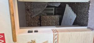 a box with a mirror on top of it at Casa German y Susanita in El Matorral +21 photos