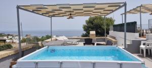 Bazén v ubytování Le Case di Sonia nebo v jeho okolí