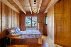 Ένα ή περισσότερα κρεβάτια σε δωμάτιο στο Fewo mit Terrasse und Garten