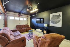 a living room with a couch and chairs and a table at Oceanfront Views! Hot Tub! Starlit Shores in Yachats