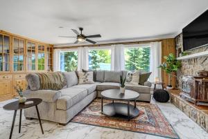 a living room with a couch and a fireplace at 4925 Pike Unit1 in Cascade-Chipita Park +25 photos