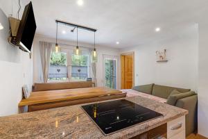 a living room with a couch and a table at Müllerleile Hof in Haslach im Kinzigtal
