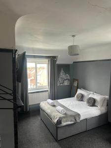 Cama o camas de una habitación en Sheridans hotel