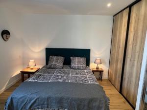 Ένα ή περισσότερα κρεβάτια σε δωμάτιο στο 200m de l'Océan