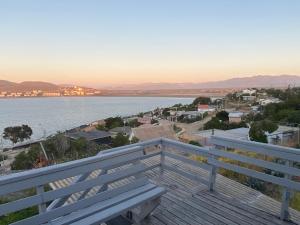 a view of the water from the balcony of a house at Cabaña Vista Mar in Tongoy