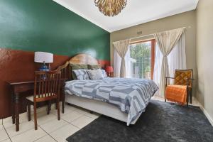 Postel nebo postele na pokoji v ubytování The Cozy home