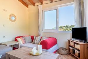 Televisyen dan/atau pusat hiburan di Arianna Grand apartment