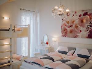 Ένα ή περισσότερα κρεβάτια σε δωμάτιο στο Pension Sterntaler