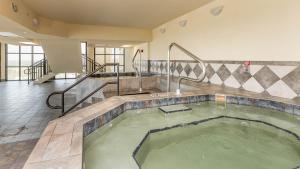 a hot tub in the middle of a building at The Oasis 2209 formerly Phoenix West II 2209 condo in Romar Beach