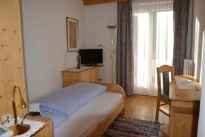 TV a/nebo společenská místnost v ubytování Gasthof Kirchsteiger