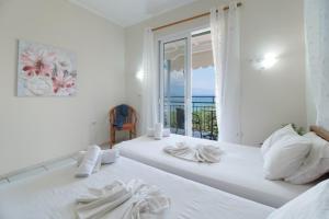 Postel nebo postele na pokoji v ubytování S7 apartment