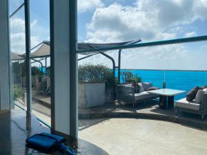 a living room with a view of the ocean at 1103 - Tháp Tam Thắng Vũng Tàu in Vung Tau