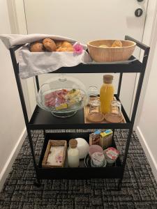 a shelf with food and other food items on it at Gh Alte Post - Top 4 Commodore in Gmünd in Kärnten