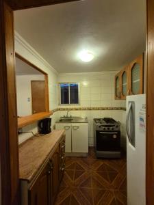 Dapur atau dapur kecil di Cabañas Alegre Monte