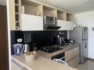 Кухня или мини-кухня в Luxury apartment 1 A club house
